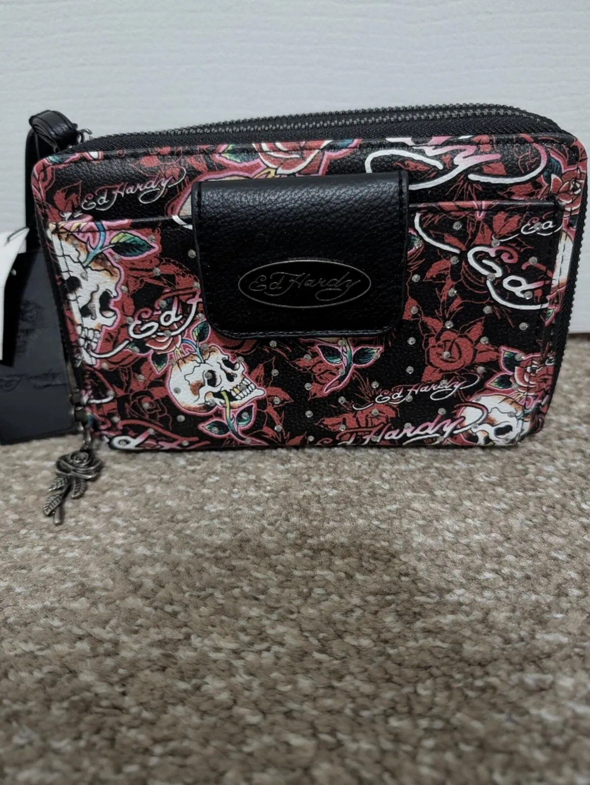 Black Ed Hardy wallet with red floral and skull print